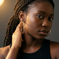 Thumbnail for Diamond Cut Statement Hoops in Gold, studio portrait | SKU: 41009-gold