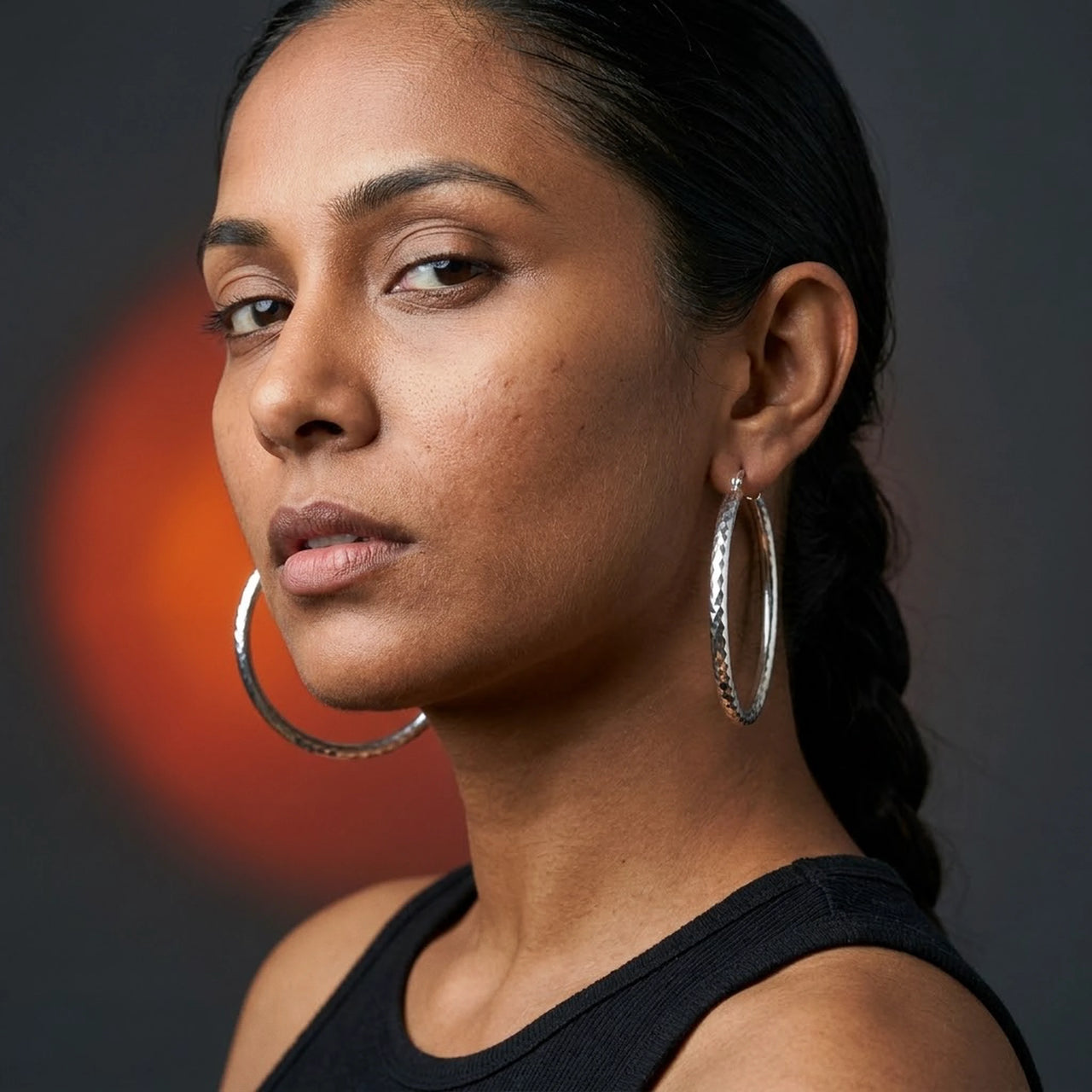 Diamond Cut Statement Hoops in Silver, studio portrait | SKU: 41009-silver