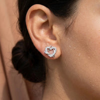 Thumbnail for Silver heart stud earrings — close-up of the details, silver | SKU: 4478648-platinum-plated-clear