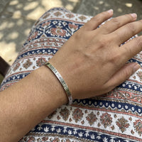 Thumbnail for Never Forget To Dream bracelet in silver worn, showing its real size | SKU: nftd-wg