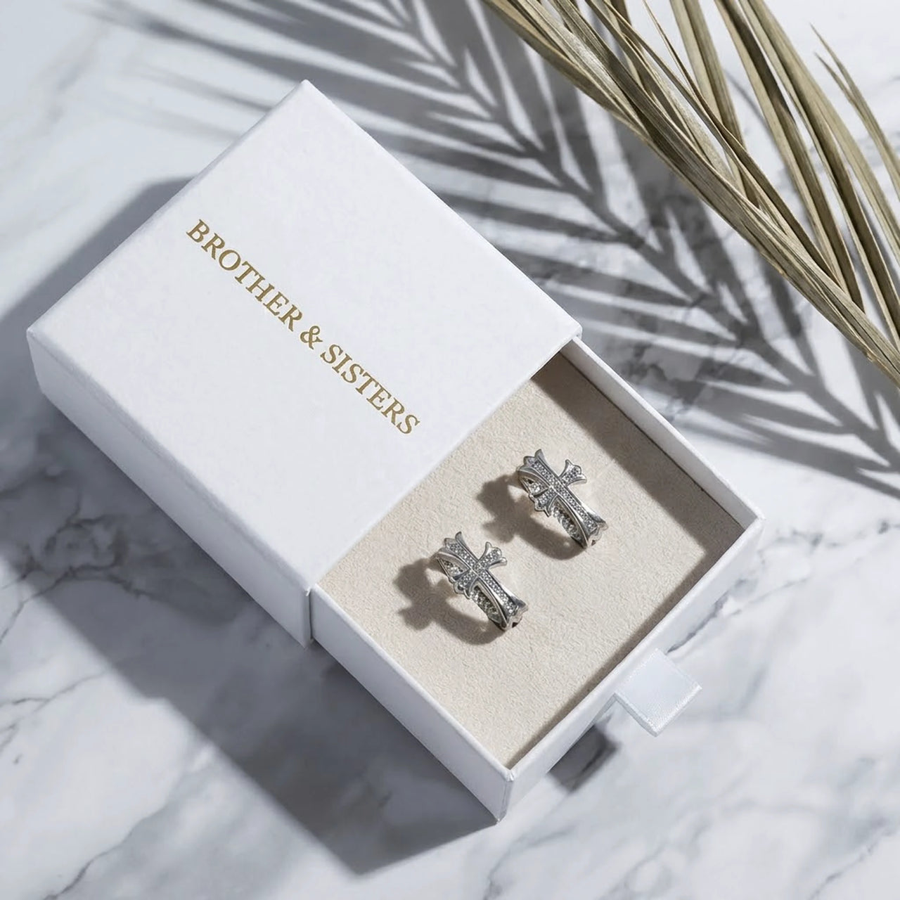 Pave Cross Huggie Hoops in Silver, in the gift box | SKU: 41006-silver