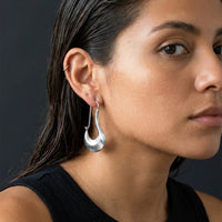Thumbnail for Sculpted Crescent Drops in Silver, studio portrait | SKU: 41008-silver